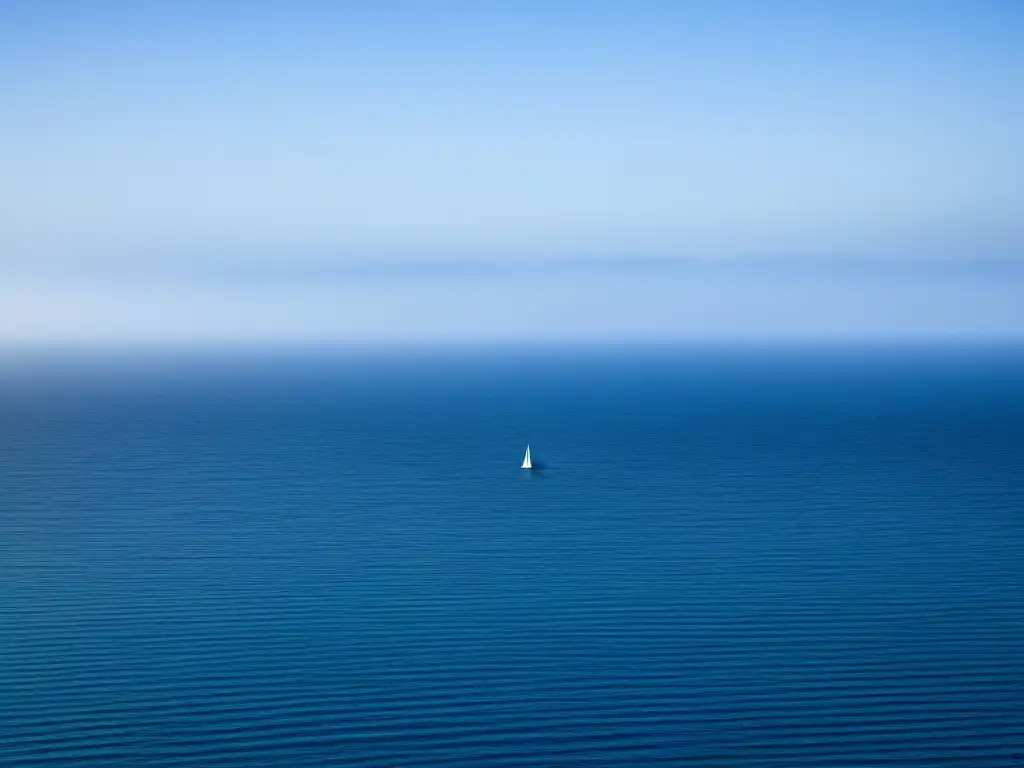 Un océano azul sereno se extiende hasta el horizonte, con un pequeño velero a lo lejos, simbolizando la economía azul sostenible global